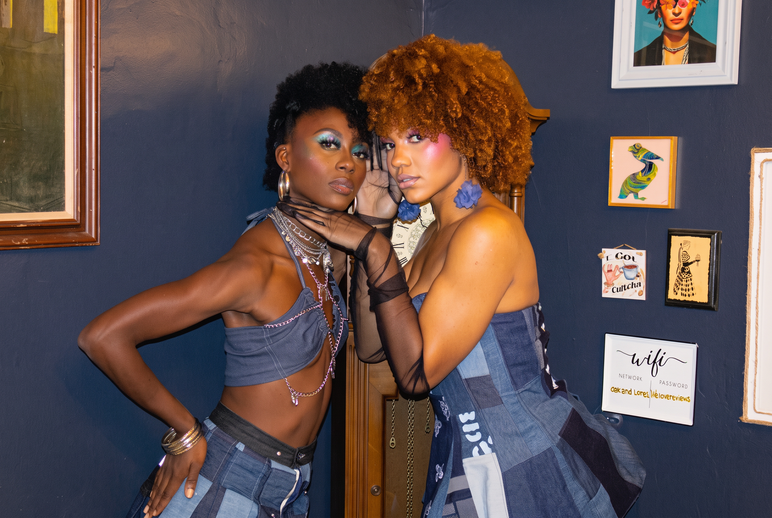 Two editorial models with natural coily and copper curly hair